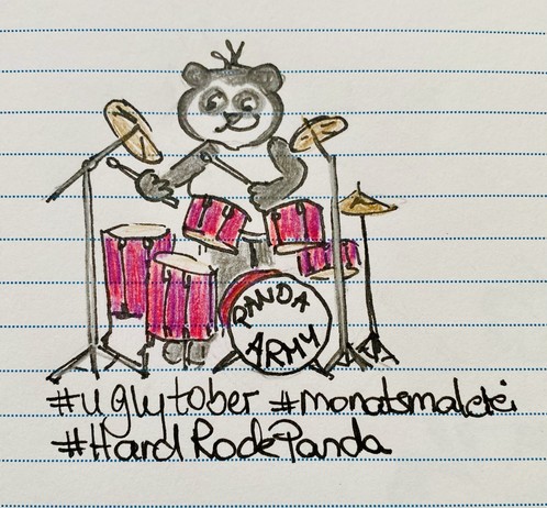 A cartoon panda playing a drum set, featuring pink drums and cymbals. The panda has a cheerful expression and is holding drumsticks. The background has lined notebook paper with hashtags below, including #uglytober, #mondaymalerei and #HardRockPanda